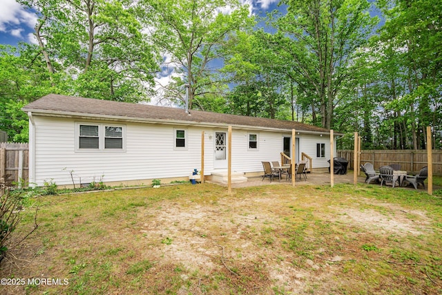 629 Alpine St, Forked River, NJ 08731 - rear view of house with a patio, view of wooded area, and roof with shingles