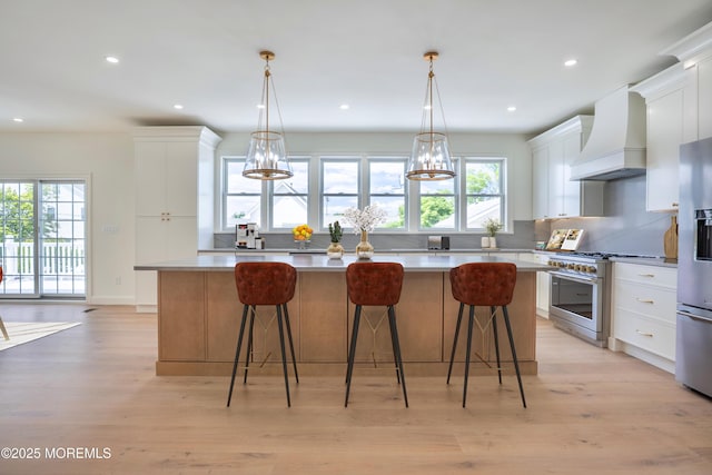 205 Parkway Pt, Pleasant Beach, NJ 08742 - kitchen featuring custom range hood, appliances with stainless steel finishes, a large island, healthy amount of natural light, and recessed lighting