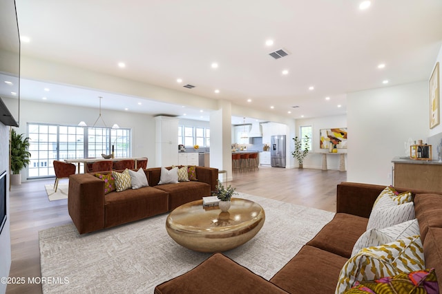 205 Parkway Pt, Pleasant Beach, NJ 08742 - living room with light wood-style floors, plenty of natural light, and recessed lighting