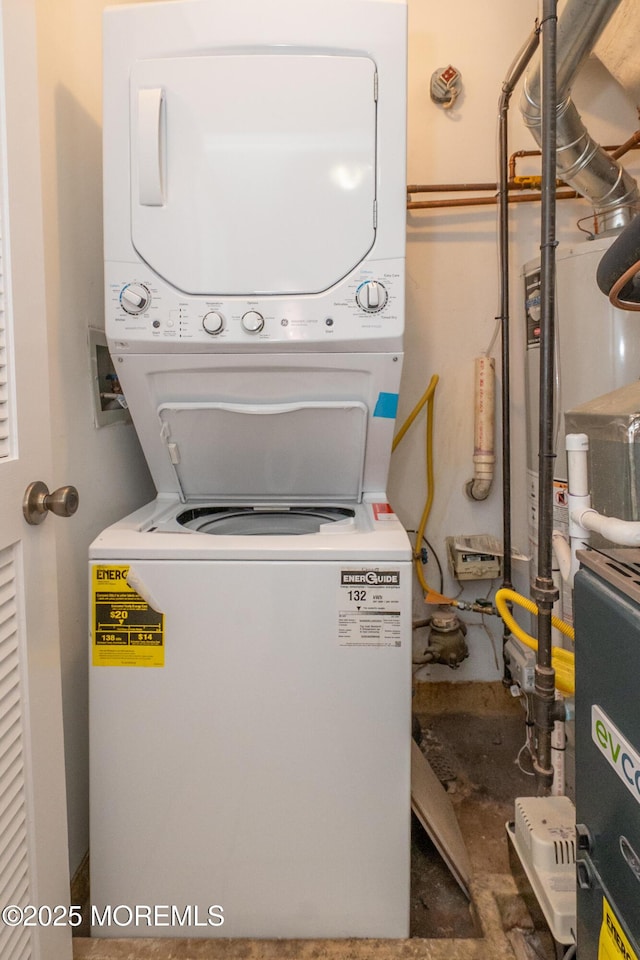 2708 Ridgefield Ct Unit 2708, Helmetta, NJ 08828 - washroom featuring stacked washing machine and dryer
