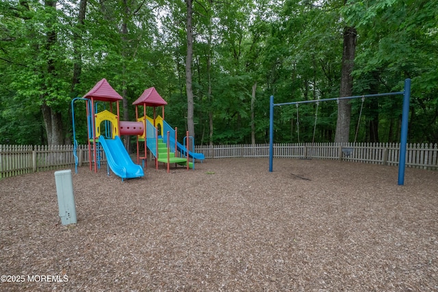 2708 Ridgefield Ct Unit 2708, Helmetta, NJ 08828 - communal playground featuring view of wooded area