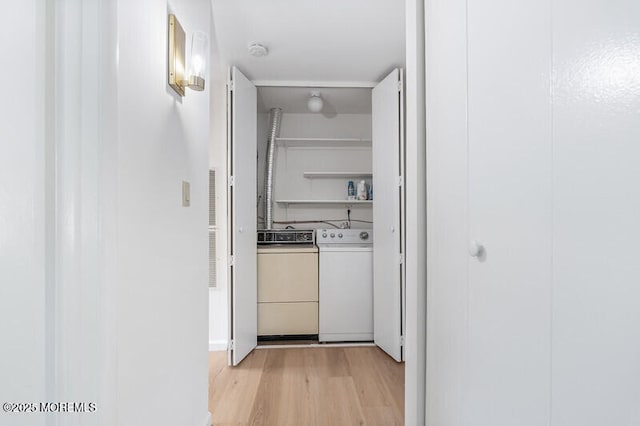 8 Holmes Ct, Brick, NJ 08724 - hallway featuring washing machine and clothes dryer and light wood-type flooring