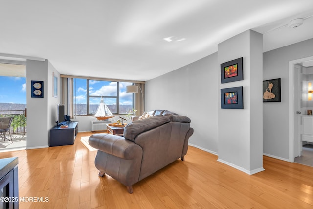 1 Scenic Dr Unit 511, Highlands, NJ 07732 - living room featuring light wood-style flooring and baseboards