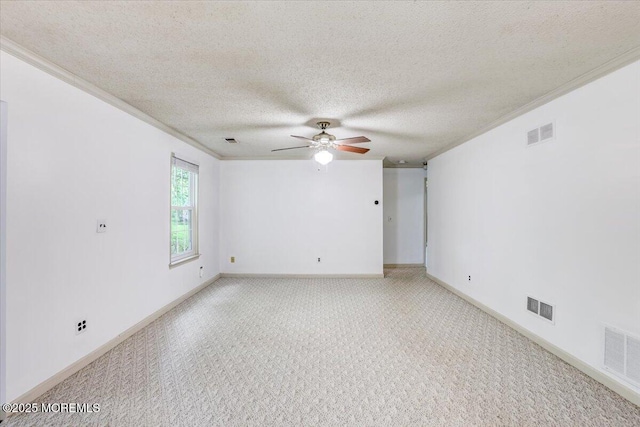 5-3 Portland Ct, Freehold, NJ 07728 - empty room with crown molding, a ceiling fan, light carpet, a textured ceiling, and baseboards