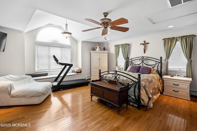 660 Summit Ave, Kenilworth, NJ 07033 - bedroom with light wood-style floors, vaulted ceiling, a baseboard radiator, and attic access
