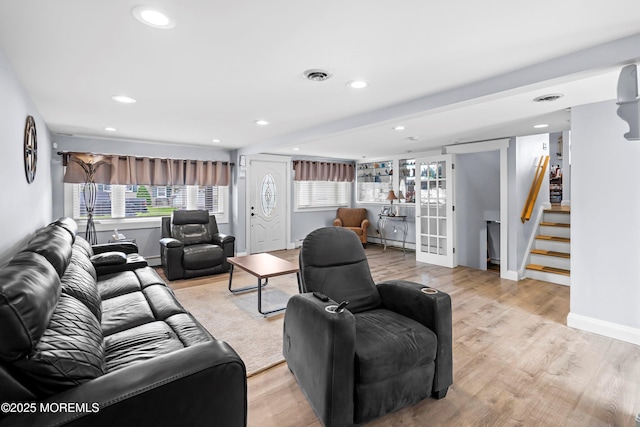 660 Summit Ave, Kenilworth, NJ 07033 - living area featuring recessed lighting, stairway, light wood-style flooring, and french doors