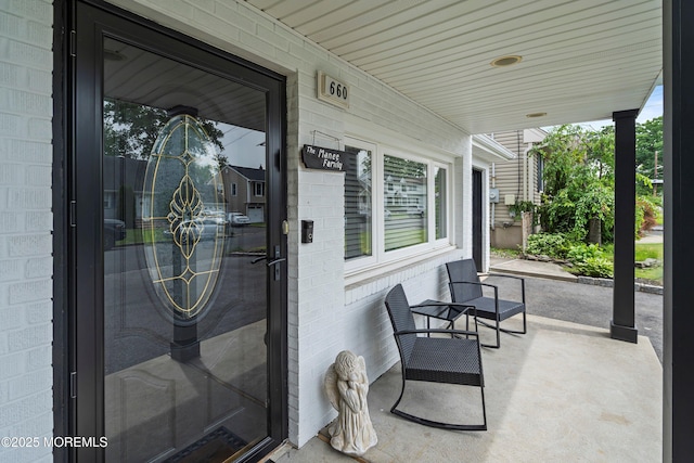 660 Summit Ave, Kenilworth, NJ 07033 - doorway to property with a porch