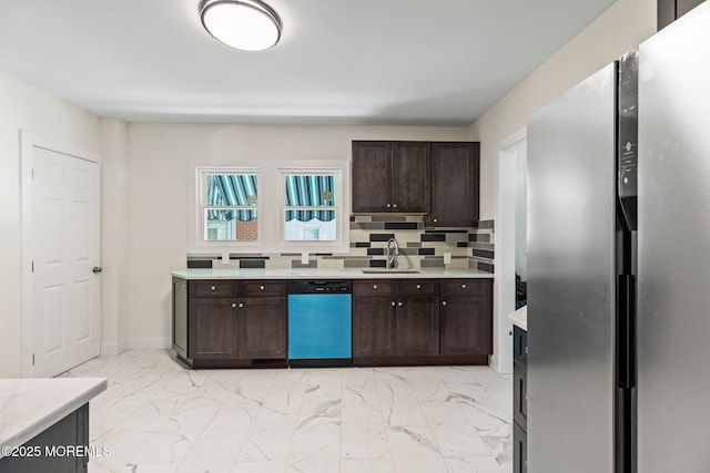 23 Stokes St, Freehold, NJ 07728 - kitchen with dishwashing machine, freestanding refrigerator, light marble finish flooring, and light countertops