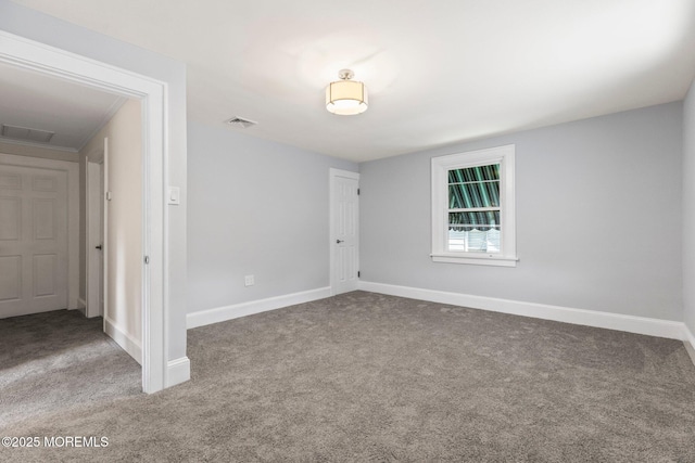 23 Stokes St, Freehold, NJ 07728 - carpeted spare room with baseboards