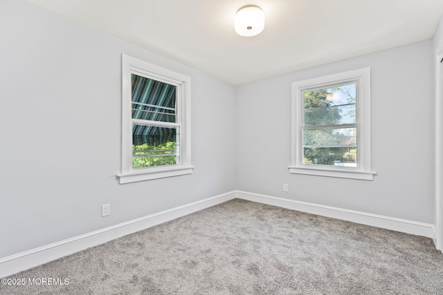 23 Stokes St, Freehold, NJ 07728 - spare room featuring carpet and baseboards