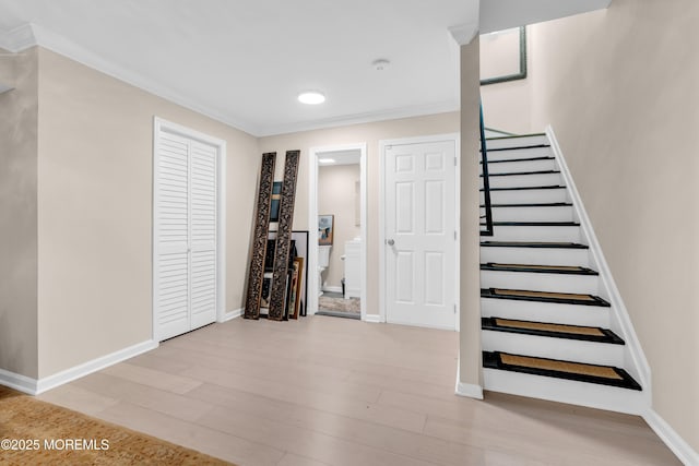 1 Portland Rd Unit 13, Highlands, NJ 07732 - stairs with crown molding, wood finished floors, and baseboards