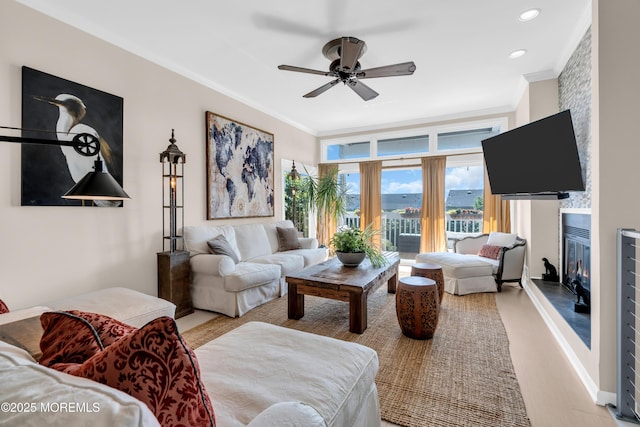 1 Portland Rd Unit 13, Highlands, NJ 07732 - living area featuring ornamental molding, ceiling fan, a large fireplace, and recessed lighting