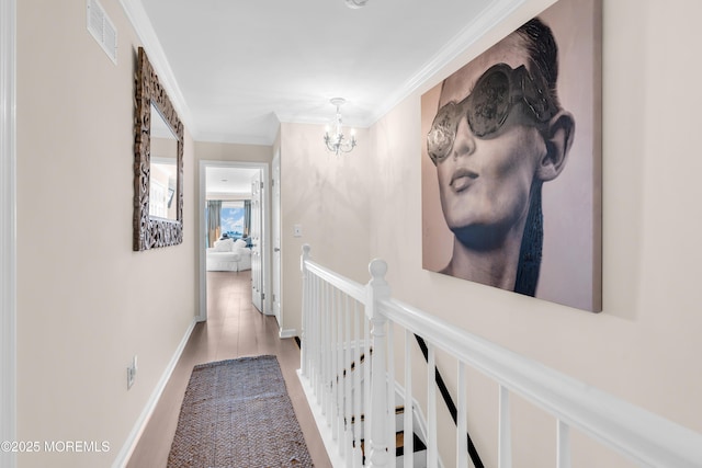1 Portland Rd Unit 13, Highlands, NJ 07732 - corridor featuring a chandelier, crown molding, an upstairs landing, and wood finished floors