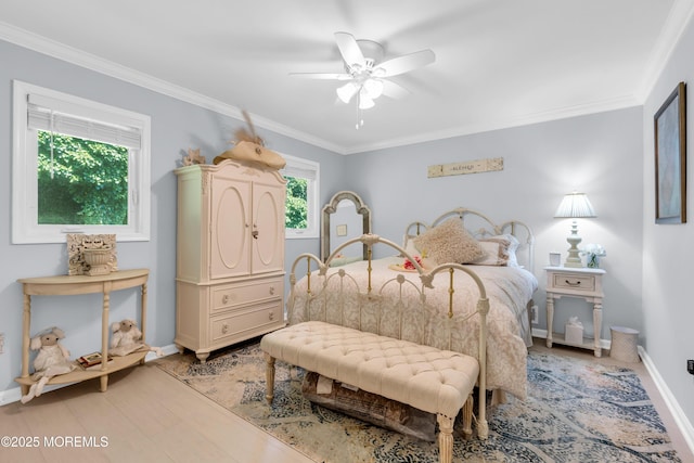 1 Portland Rd Unit 13, Highlands, NJ 07732 - bedroom featuring baseboards, ornamental molding, light wood finished floors, and ceiling fan