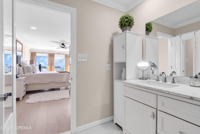 1 Portland Rd Unit 13, Highlands, NJ 07732 - bathroom featuring a ceiling fan, vanity, baseboards, crown molding, and ensuite bathroom