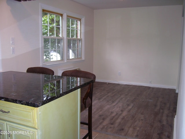 364 Westwood Ave Unit 12, Long Branch, NJ 07740 - dining space featuring dark wood finished floors and baseboards
