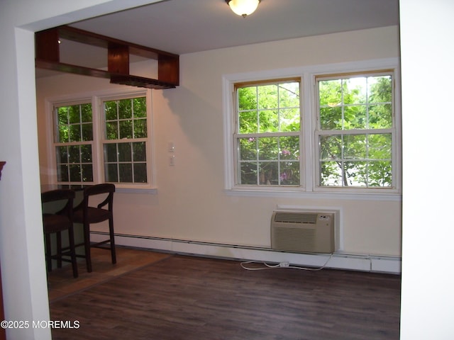 364 Westwood Ave Unit 12, Long Branch, NJ 07740 - dining area featuring wood finished floors, a wall mounted AC, plenty of natural light, and a baseboard heating unit