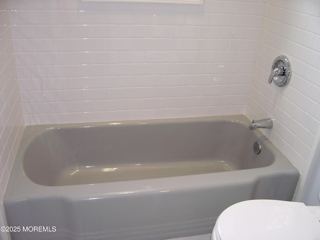 364 Westwood Ave Unit 12, Long Branch, NJ 07740 - bathroom featuring toilet and a tub