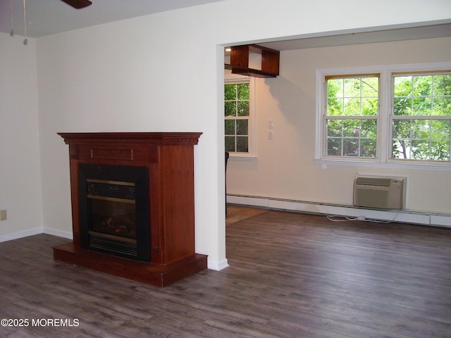 364 Westwood Ave Unit 12, Long Branch, NJ 07740 - unfurnished living room with dark wood-style flooring, a glass covered fireplace, a ceiling fan, baseboards, and baseboard heating
