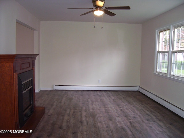 364 Westwood Ave Unit 12, Long Branch, NJ 07740 - unfurnished living room featuring dark wood-type flooring, a ceiling fan, a glass covered fireplace, a baseboard radiator, and baseboards