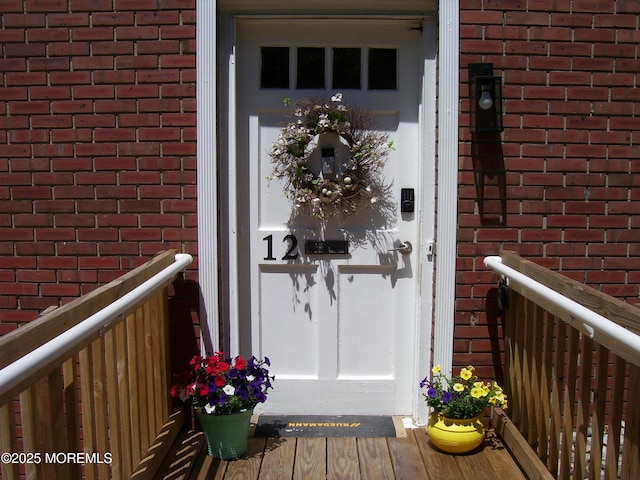 364 Westwood Ave Unit 12, Long Branch, NJ 07740 - doorway to property featuring brick siding