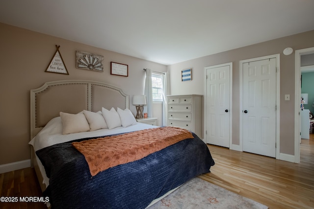 20 Koosman Dr, Leonardo, NJ 07737 - bedroom featuring wood finished floors, multiple closets, and baseboards