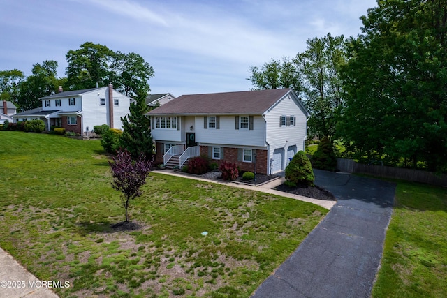 20 Koosman Dr, Leonardo, NJ 07737 - view of front facade with an attached garage, asphalt driveway, and brick siding
