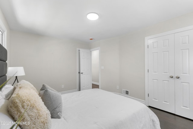 5 S Dakota Ave, Jackson, NJ 08527 - bedroom featuring baseboards, dark wood-style flooring, and a closet