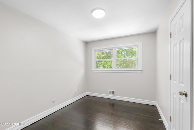 5 S Dakota Ave, Jackson, NJ 08527 - unfurnished bedroom featuring dark wood-type flooring and baseboards
