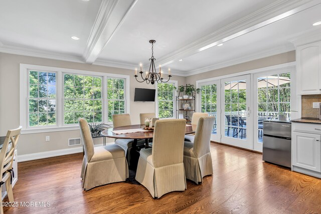 71 Maple Ave, Little Silver, NJ 07739 - dining space with a chandelier, baseboards, wood finished floors, crown molding, and beam ceiling