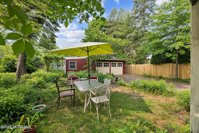 228 Albert Pl, Elberon, NJ 07740 - view of yard with an outdoor structure, outdoor dining space, and a patio