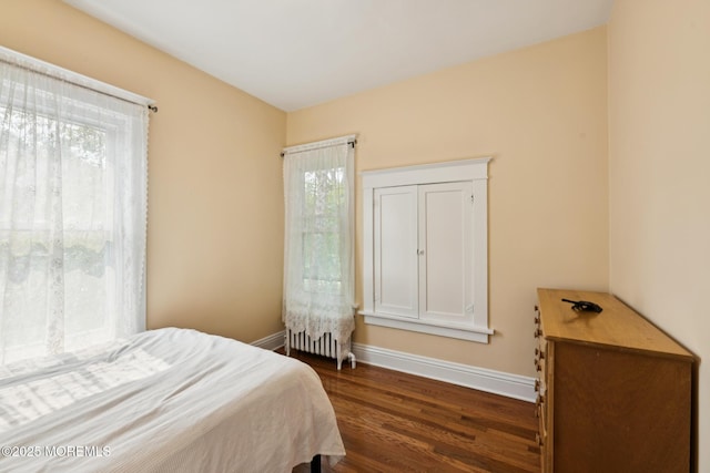 228 Albert Pl, Elberon, NJ 07740 - bedroom featuring baseboards, dark wood finished floors, and radiator