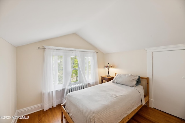 228 Albert Pl, Elberon, NJ 07740 - bedroom featuring wood finished floors, vaulted ceiling, and baseboards