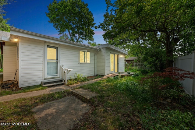 228 Albert Pl, Elberon, NJ 07740 - back of house at dusk featuring entry steps