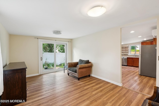 228 Albert Pl, Elberon, NJ 07740 - sitting room with healthy amount of natural light, light wood-type flooring, baseboards, and recessed lighting