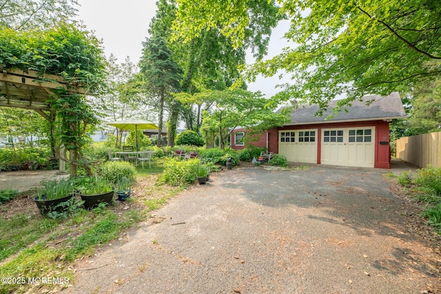228 Albert Pl, Elberon, NJ 07740 - view of front of home with driveway and a garage