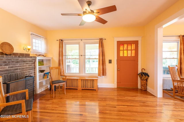 228 Albert Pl, Elberon, NJ 07740 - entryway with light wood-type flooring, a ceiling fan, radiator, radiator heating unit, and baseboards