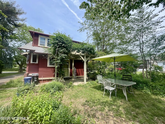 228 Albert Pl, Elberon, NJ 07740 - back of property featuring a lawn