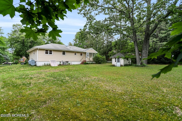 9 Riccis Dr, Jackson, NJ 08527 - view of grassy yard featuring view of scattered trees