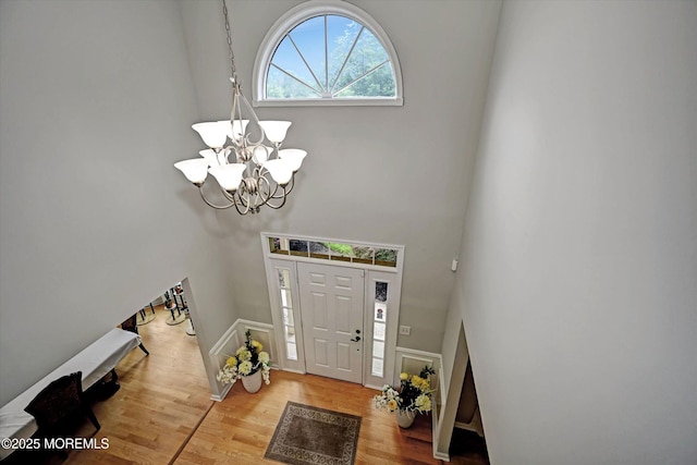 2 Hampton Hollow Dr, Perrineville, NJ 08535 - foyer featuring a chandelier and wood finished floors
