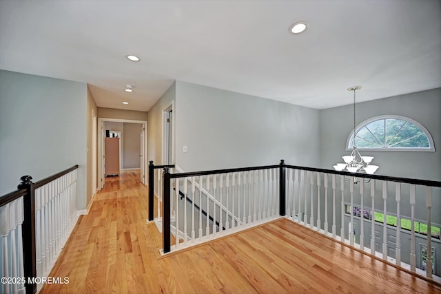2 Hampton Hollow Dr, Perrineville, NJ 08535 - hallway featuring an upstairs landing, a chandelier, wood finished floors, recessed lighting, and baseboards