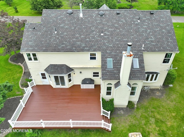 2 Hampton Hollow Dr, Perrineville, NJ 08535 - rear view of property with a chimney, a deck, and a high end roof