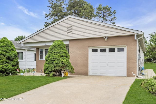 87 Prince Charles Dr, Toms River, NJ 08757 - ranch-style house with brick siding, driveway, and a front yard