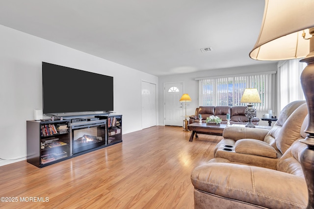 87 Prince Charles Dr, Toms River, NJ 08757 - living area featuring light wood-style floors and baseboards