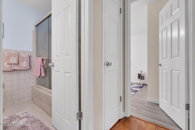87 Prince Charles Dr, Toms River, NJ 08757 - full bath with a tub to relax in, heating unit, wood finished floors, and a shower