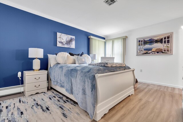 87 Prince Charles Dr, Toms River, NJ 08757 - bedroom featuring a baseboard radiator, wood finished floors, crown molding, and baseboards