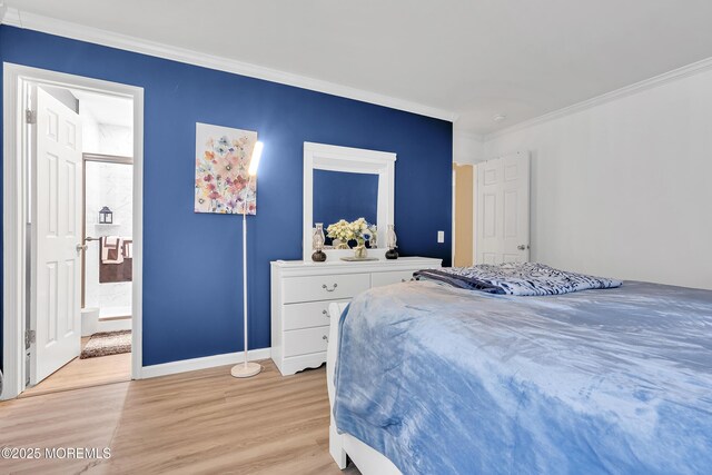 87 Prince Charles Dr, Toms River, NJ 08757 - bedroom featuring ornamental molding, light wood finished floors, baseboards, and ensuite bathroom