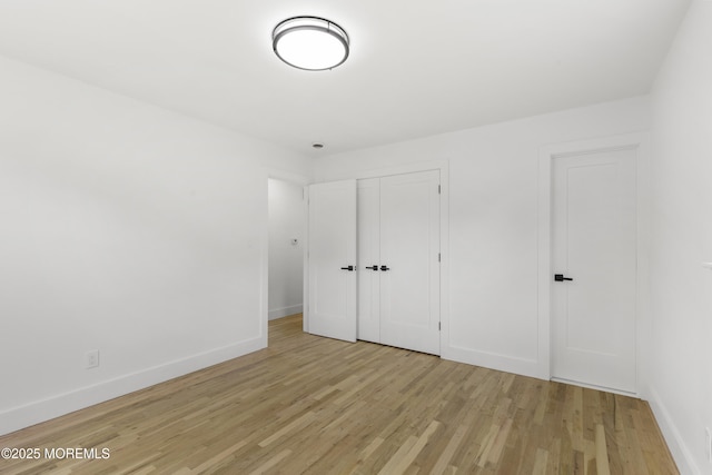23 Drexel Dr, Jackson, NJ 08527 - unfurnished bedroom featuring wood finished floors, baseboards, and a closet
