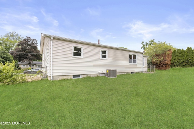 23 Drexel Dr, Jackson, NJ 08527 - back of house featuring cooling unit and a lawn
