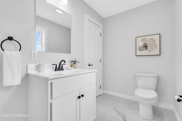 231 Cedar Island Dr, Brick, NJ 08723 - half bath with toilet, vanity, baseboards, and marble finish flooring